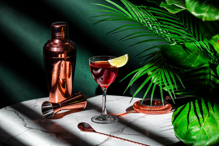 Irish Jack Rose alcoholic cocktail drink with Irish whiskey, calvados, lime juice, grenadine and lime sliceの写真素材