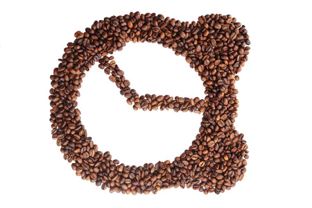 Coffee beans in clock symbol isolated on whiteの写真素材
