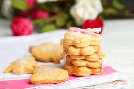 Cookies on napkin, on white wooden backgroundの写真素材