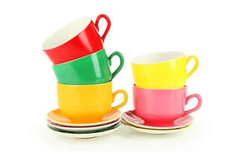 Colorful cups isolated on whiteの写真素材