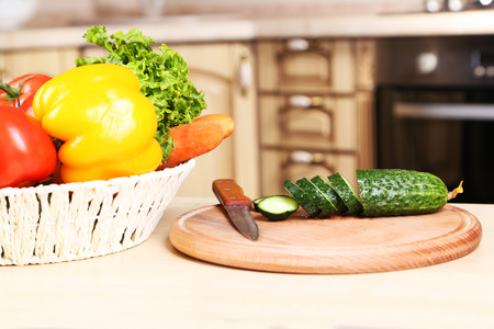 Fresh vegetables on a table in the kitchenの写真素材