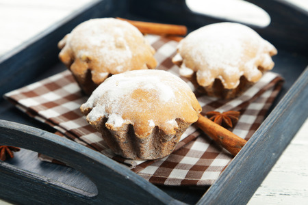 Cupcake in tray on white wooden backgroundの写真素材