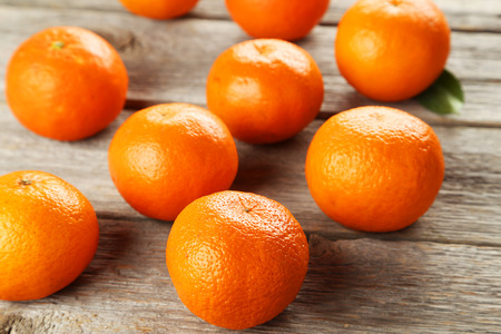 Mandarin on grey wooden backgroundの写真素材