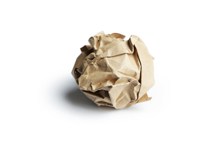 Crumpled paper ball isolated on whiteの写真素材