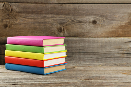 Open books on grey wooden backgroundの写真素材