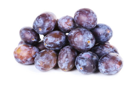 Fresh plums isolated on whiteの写真素材