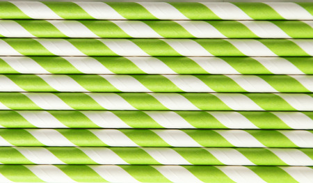 Striped straws for cocktails on white backgroundの写真素材