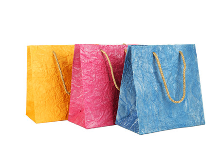 Colorful gift bags isolated on whiteの写真素材