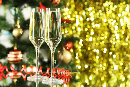 Glasses of champagne on a lights backgroundの写真素材