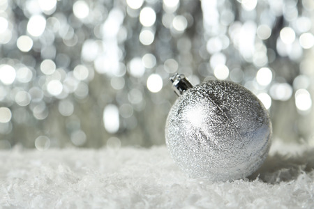 Christmas ball on lights backgroundの写真素材