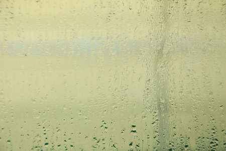 Fogged up glass with many drops