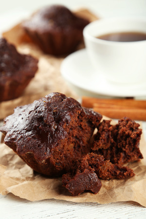 Chocolate cupcake on white wooden backgroundの写真素材