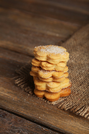 Cookies on brown wooden backgroundの写真素材