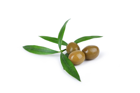 Green olives isolated on whiteの写真素材