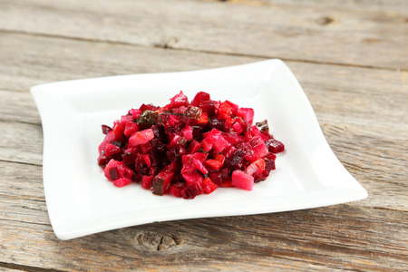 Beetroot salad on plate on grey wooden backgroundの写真素材