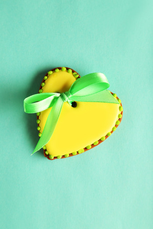 Heart shaped cookies on green backgroundの写真素材
