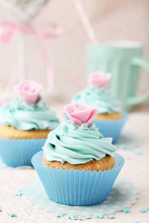 Tasty cupcake on pink backgroundの写真素材