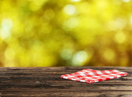 Background with wooden table with napkinの写真素材