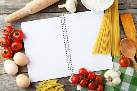 Open blank recipe book on grey wooden backgroundの写真素材
