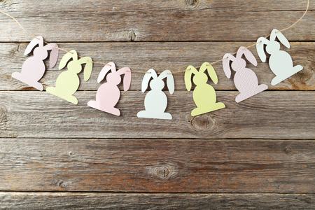 Beautiful easter rabbit on grey wooden backgroundの写真素材