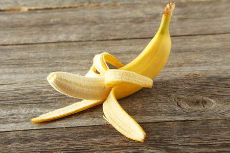 Bananas on grey wooden backgroundの写真素材