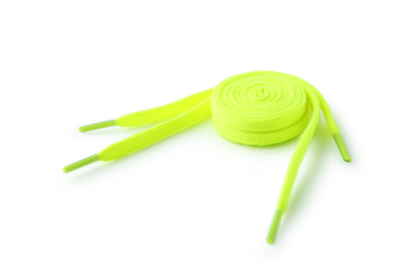Green shoelaces isolated on white