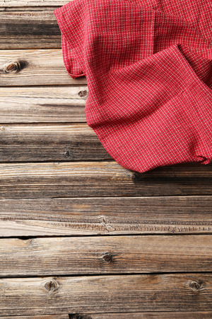 Napkin on brown wooden backgroundの写真素材