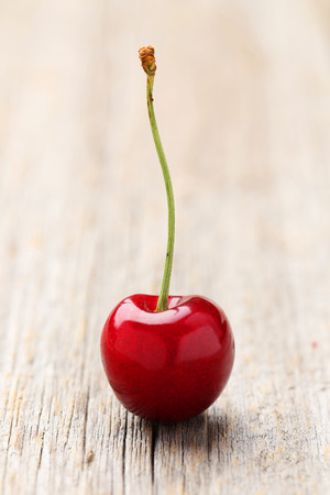 Sweet cherry on grey wooden backgroundの写真素材