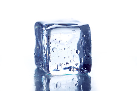 Ice cube isolated on whiteの写真素材