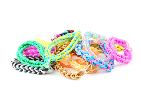 Colorful rubber band bracelets isolated on whiteの写真素材
