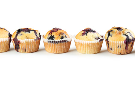 Tasty blueberry muffins isolated on a whiteの写真素材