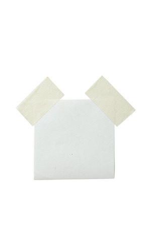 Piece of note paper on white backgroundの写真素材