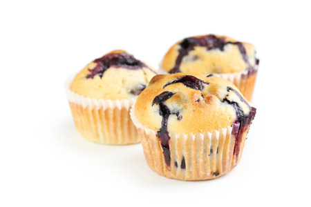 Tasty blueberry muffins isolated on a whiteの写真素材