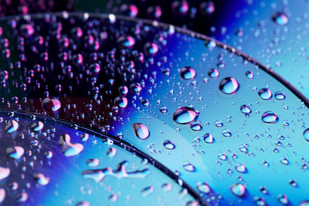 Water drops on cd, close upの写真素材