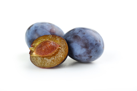 Fresh plums isolated on a whiteの写真素材