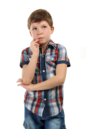 Portrait of beautiful little boy isolated on whiteの写真素材