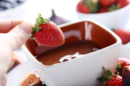 Chocolate fondue with fresh berries, close upの写真素材
