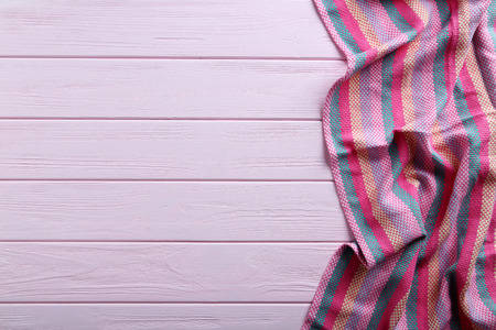 Napkin on pink wooden table, close upの写真素材