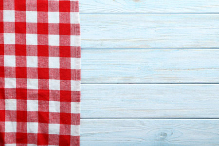 Napkin on blue wooden table, close upの写真素材
