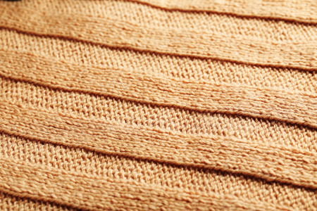 Knitted woolen fabric background, close upの写真素材