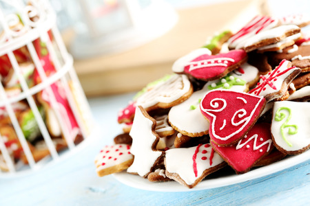 Gingerbread cookies on a blue wooden tableの写真素材