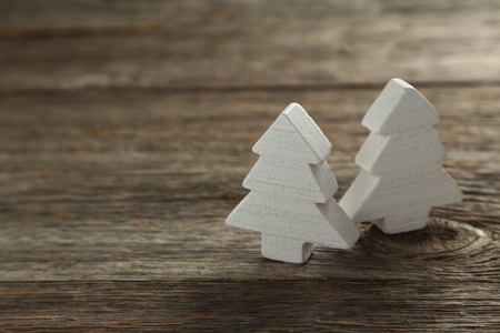 Decorative fir-tree on a grey wooden backgroundの写真素材