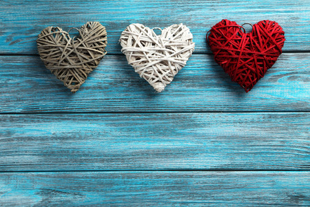 Love hearts on a blue wooden backgroundの写真素材