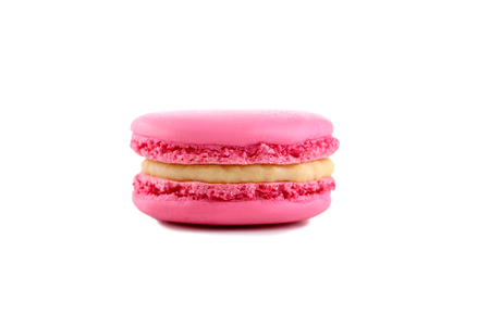 Tasty pink macarons isolated on whiteの写真素材