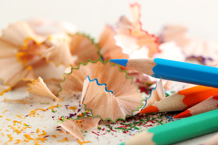 Drawing colourful pencils on a wooden backgroundの写真素材