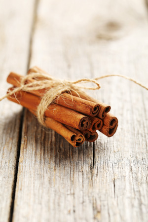 Cinnamon on a grey wooden backgroundの写真素材