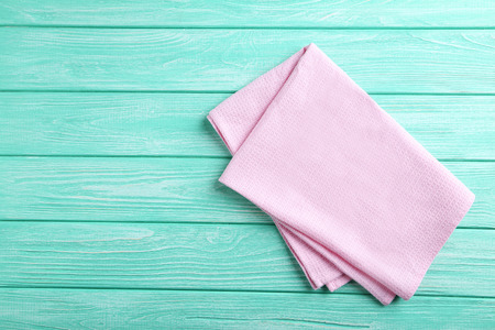Napkin on mint wooden table, close upの写真素材