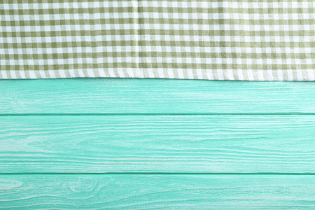 Napkin on mint wooden table, close upの写真素材