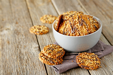 Chocolate chip cookies on a grey wooden tableの写真素材