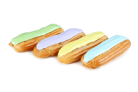 Eclairs with glaze isolated on a white